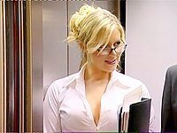 Enticing Abi Tismuss  down blouse video. Her semi open blouse is revealing part of her big breasts showing off her black bra. This upskirt elevator scene showing her garter and panty hose is very titillating!